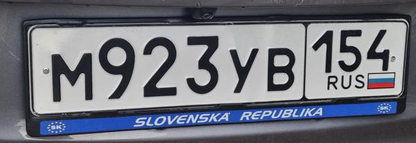 Russia spotted in Bratislava, Slovakia. 154 = Novosibirsk Oblast. Photo taken on 20.11.2025. Close-up photo of the rear plate.